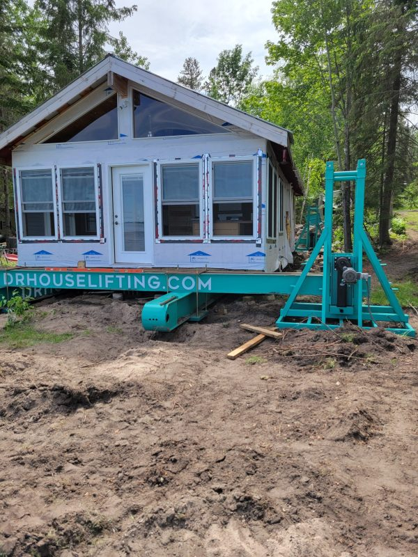 Crew preparing home for lift