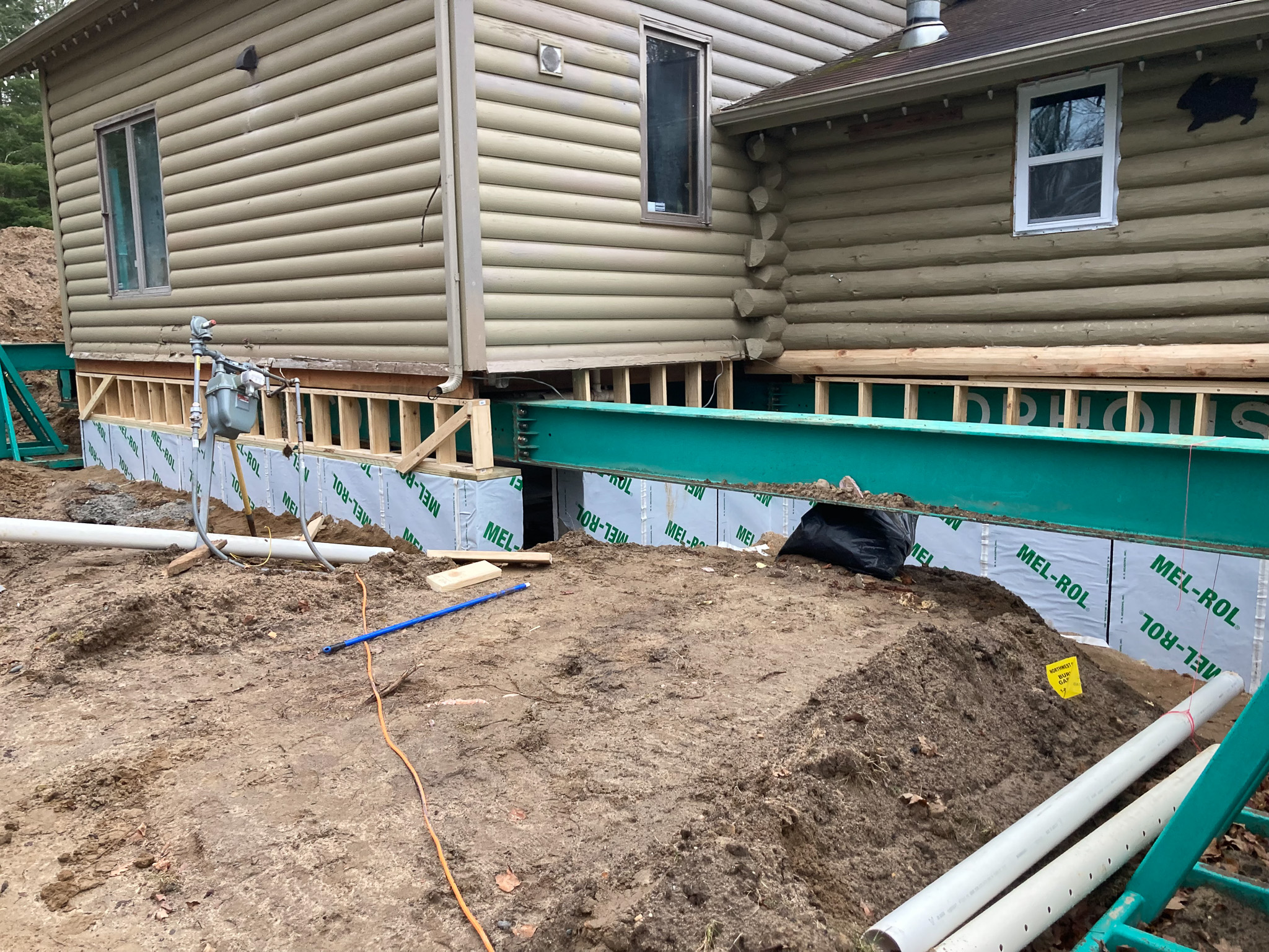 Crew on site during a home elevation project
